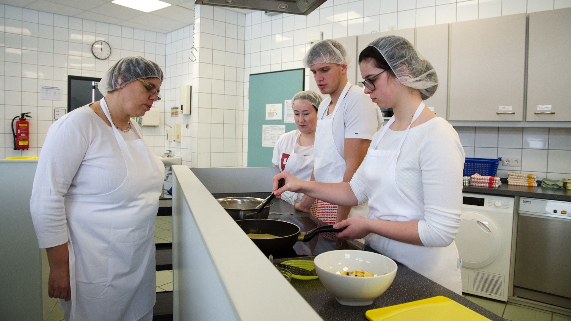 Arbeit in der Lehrküche